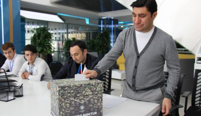 Год Нисанов: Чемодан налички, Вокзал, СИЗО